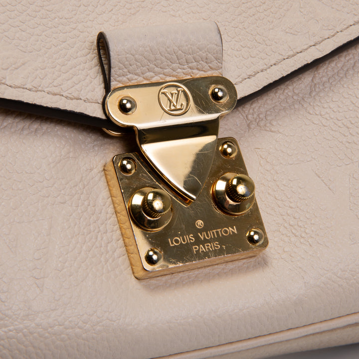 LOUIS VUITTON Monogram Empreinte Pochette Metis East West - Cream